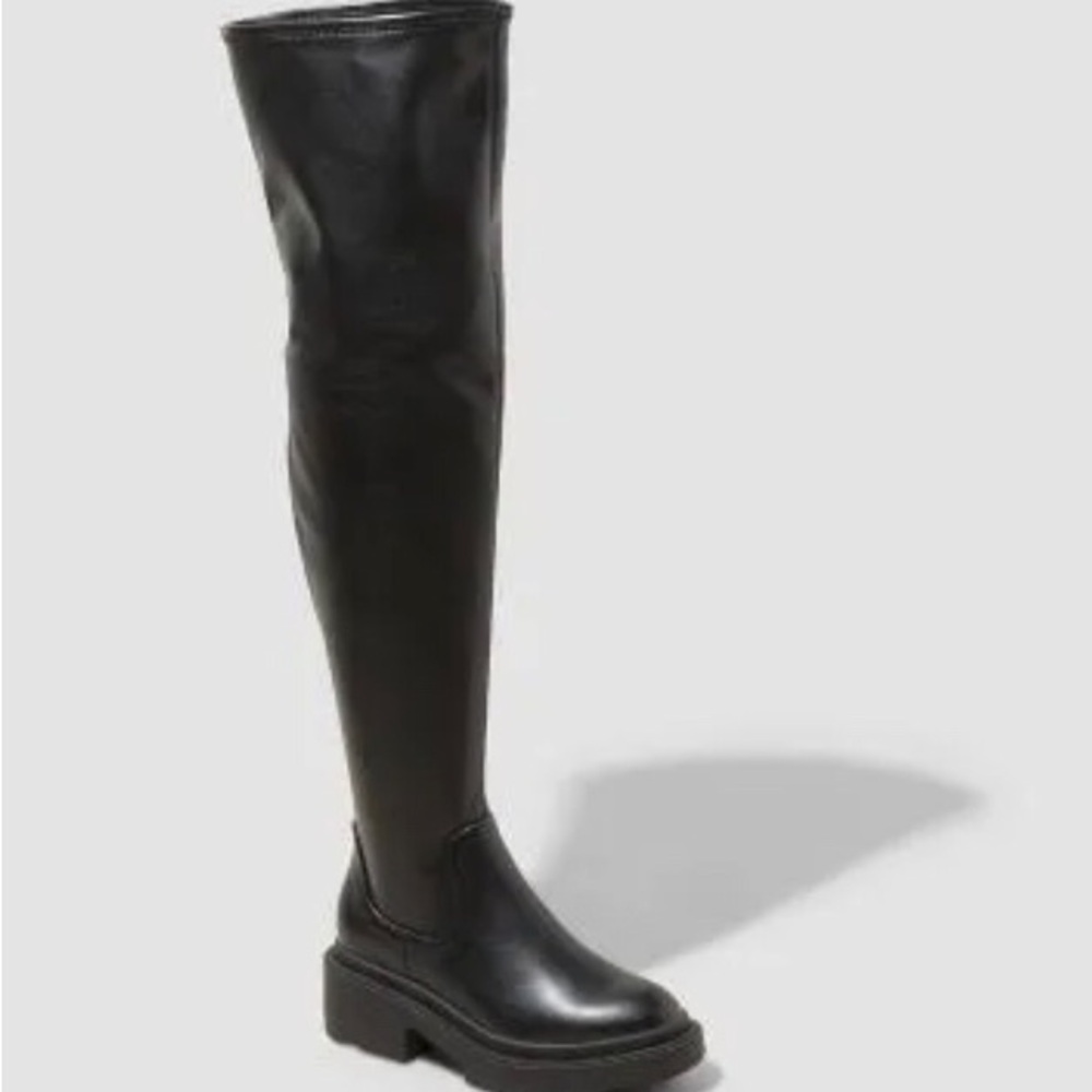 Thigh high stretch faux leather boots